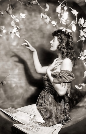 ACJ pointing amid flowers2 copy