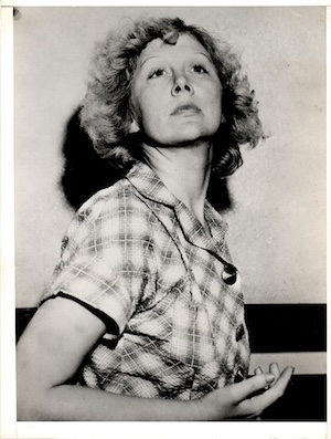 Helen in jail clothes posing copy